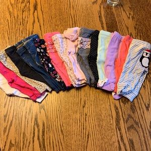 Sixteen 0-3 month old girls pants.